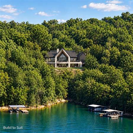 6.58 Acres of Land with Home for Sale in Garfield, Arkansas