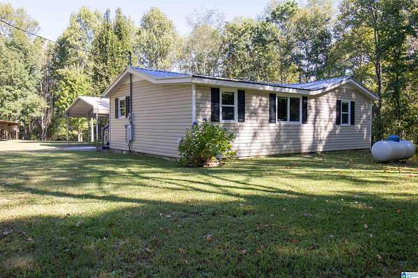 3.6 Acres of Land with Home for Sale in Falkville, Alabama