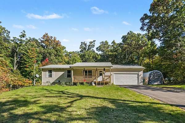 4.87 Acres of Land with Home for Sale in Holton, Michigan