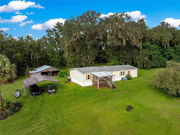 4.89 Acres of Land with Home for Sale in Belleview, Florida