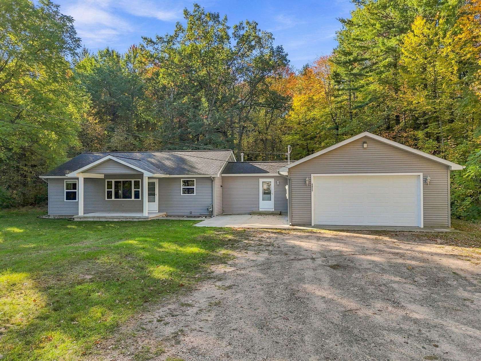 10 Acres of Land with Home for Sale in Houghton Lake, Michigan