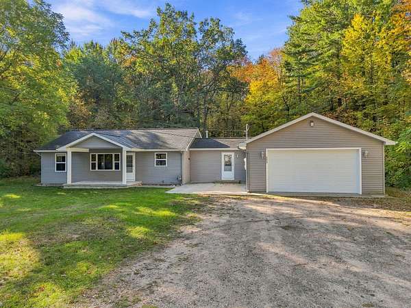 10 Acres of Land with Home for Sale in Houghton Lake, Michigan