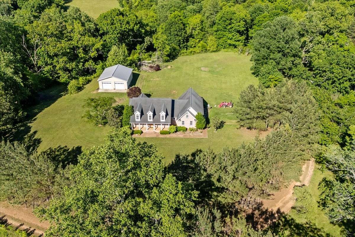 296 Acres of Agricultural Land with Home for Sale in Dickson, Tennessee