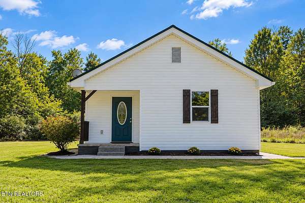 1.5 Acres of Land with Home for Sale in Riceville, Tennessee