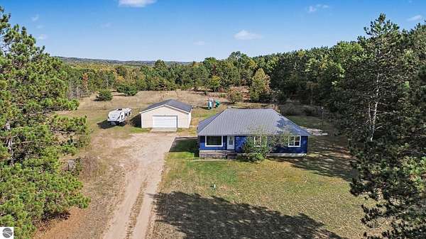 8 Acres of Land with Home for Sale in Mesick, Michigan