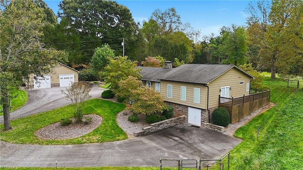 17.3 Acres of Land with Home for Sale in Purlear, North Carolina