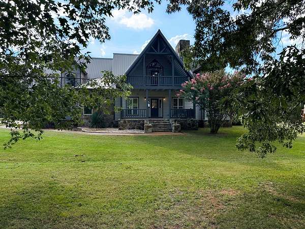 12 Acres of Land with Home for Auction in Laceys Spring, Alabama