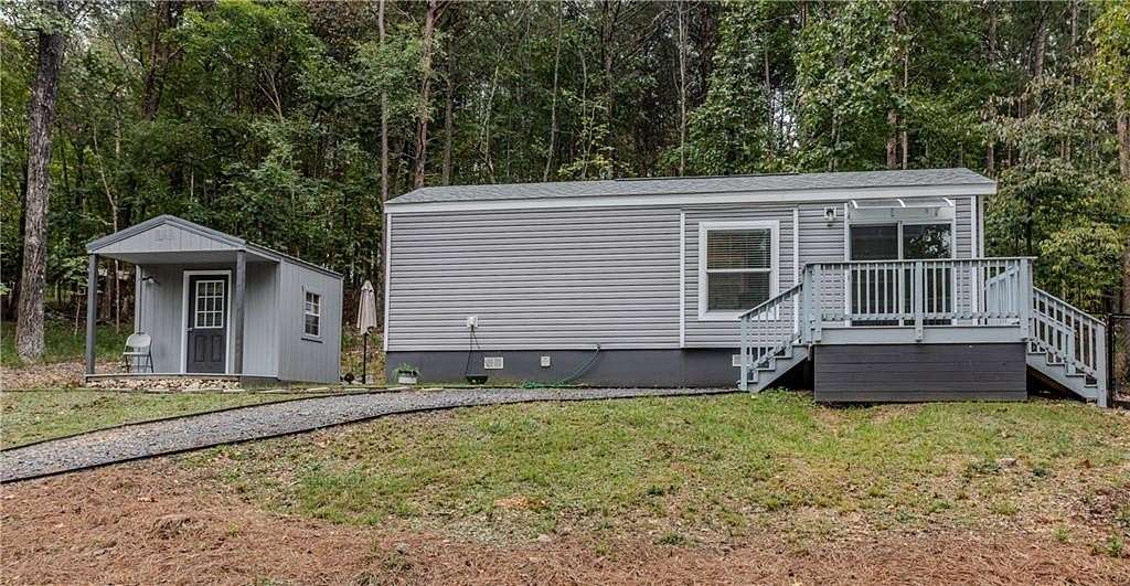 0.69 Acres of Land with Home for Sale in Lyerly, Georgia
