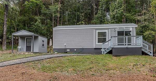 0.69 Acres of Land with Home for Sale in Lyerly, Georgia