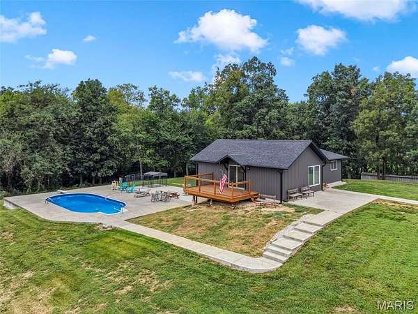 6.57 Acres of Land with Home for Sale in Elsberry, Missouri