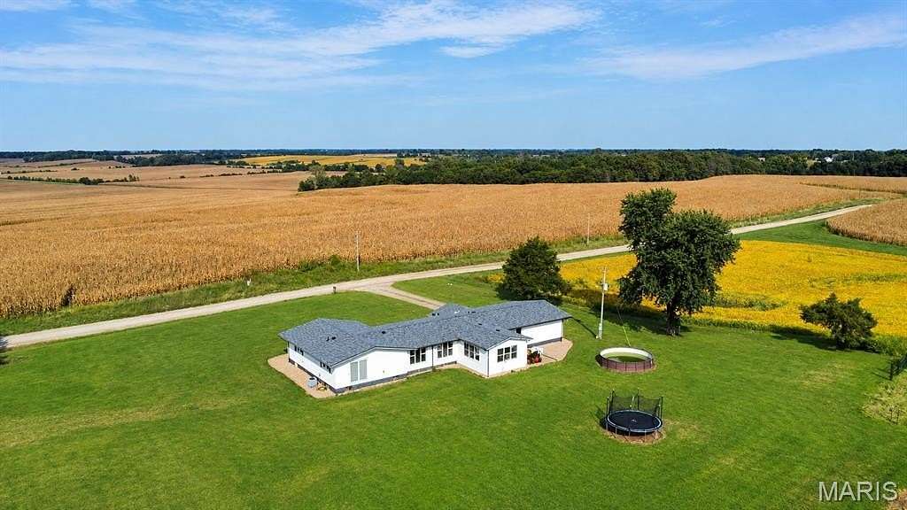 9.2 Acres of Land with Home for Sale in Ewing, Missouri