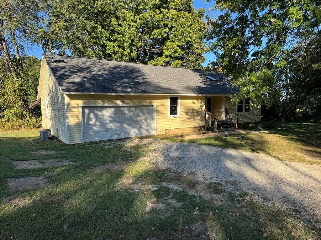 5.63 Acres of Land with Home for Sale in Rogers, Arkansas