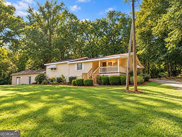 6.6 Acres of Land with Home for Sale in Forsyth, Georgia