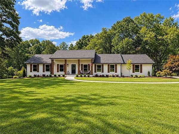 5.12 Acres of Land with Home for Sale in Cumming, Georgia