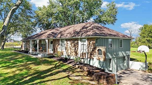 2.35 Acres of Land with Home for Sale in Belton, Missouri