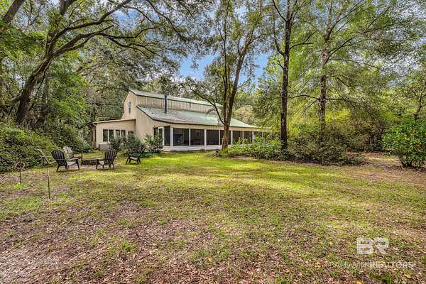 7.9 Acres of Land with Home for Sale in Loxley, Alabama