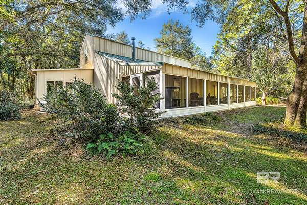 7.9 Acres of Land with Home for Sale in Loxley, Alabama