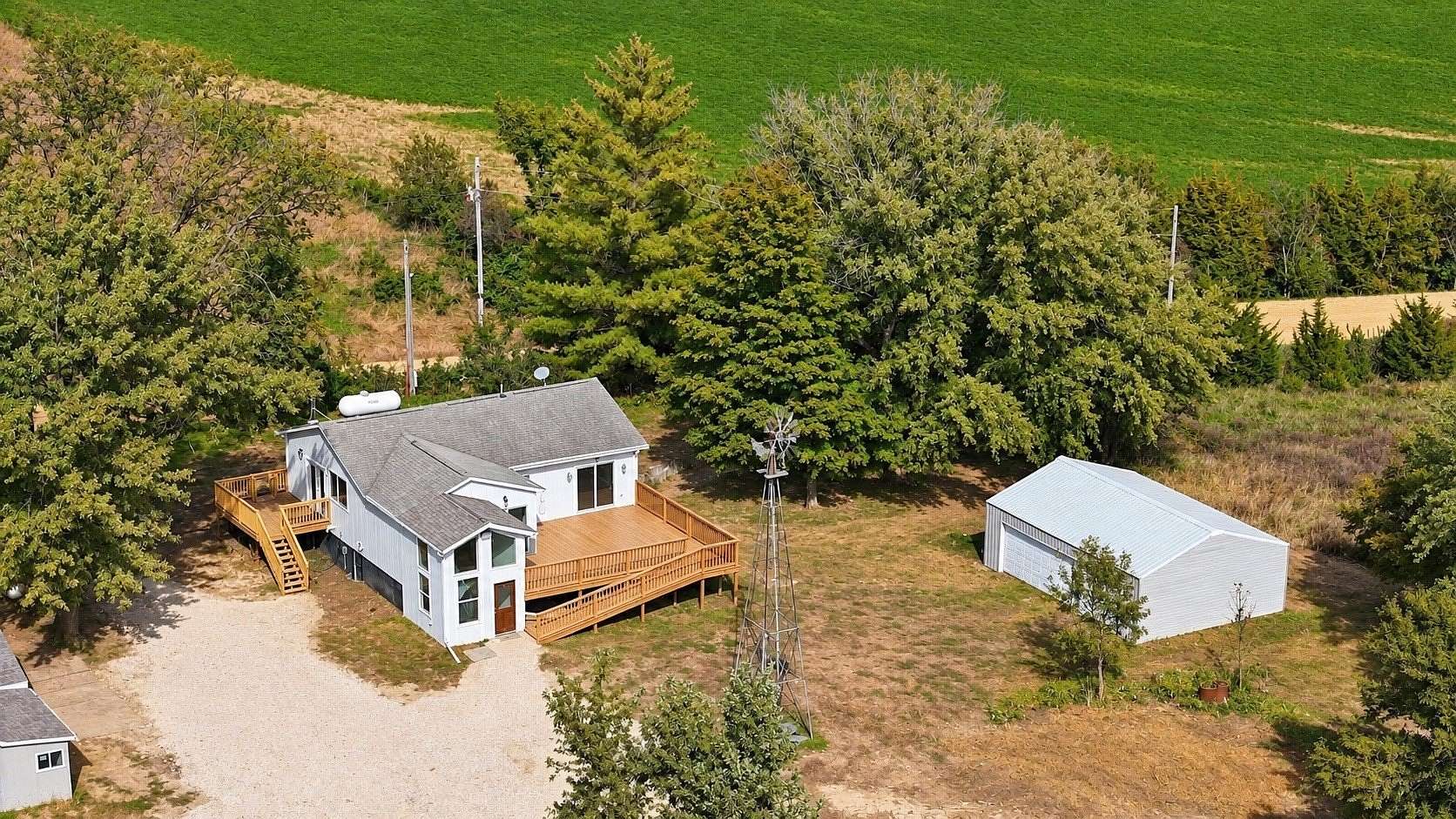 3.86 Acres of Land with Home for Sale in Stuart, Iowa