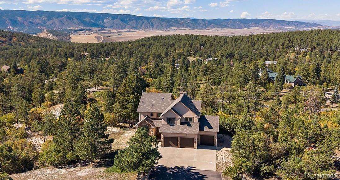 5.2 Acres of Land with Home for Sale in Larkspur, Colorado