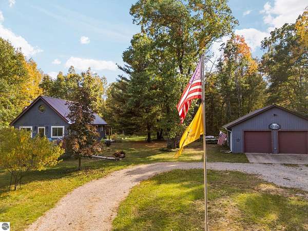 4.9 Acres of Land with Home for Sale in Wellston, Michigan