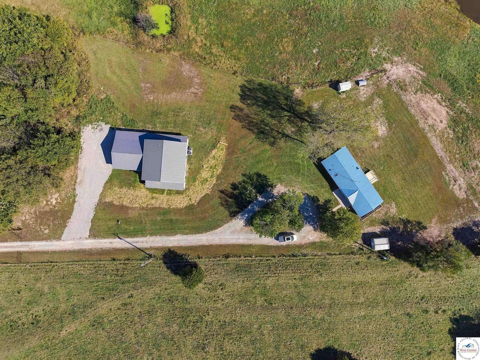 8.79 Acres of Land with Home for Sale in Smithton, Missouri