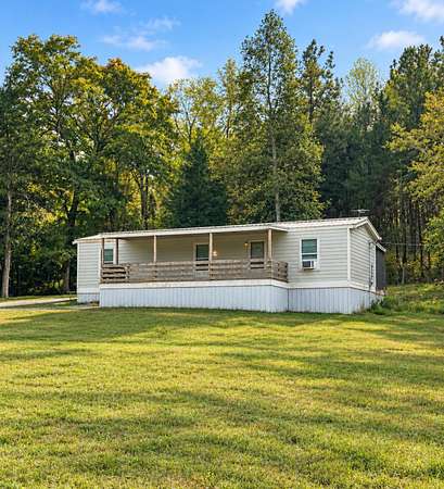 22 Acres of Land with Home for Sale in Hohenwald, Tennessee