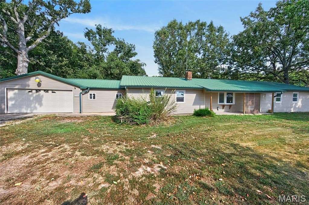 16.3 Acres of Recreational Land with Home for Sale in Richland, Missouri