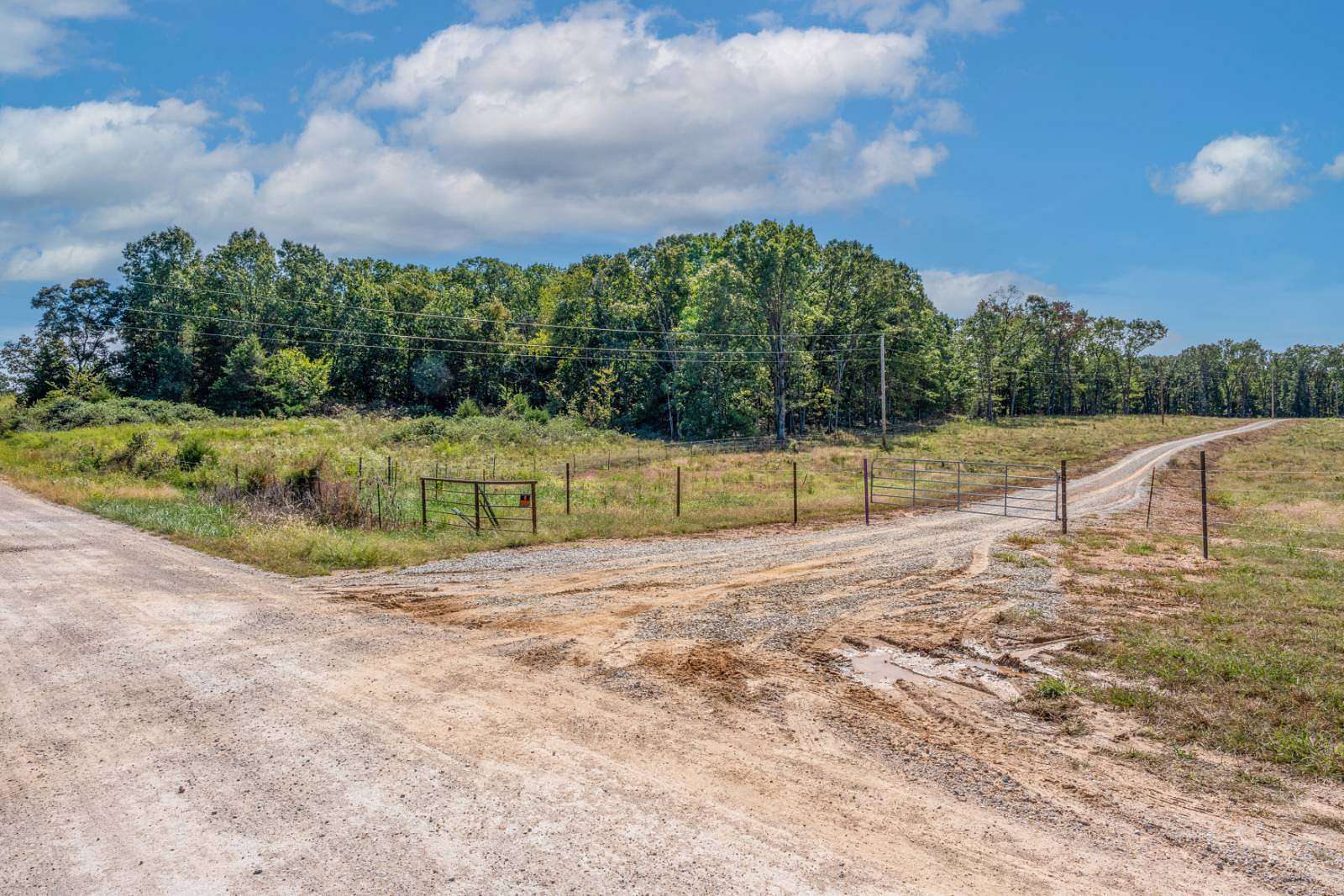 104 Acres of Land with Home for Sale in Cole Camp, Missouri