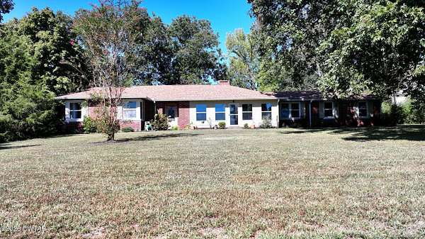 12.9 Acres of Land with Home for Sale in Trenton, Tennessee