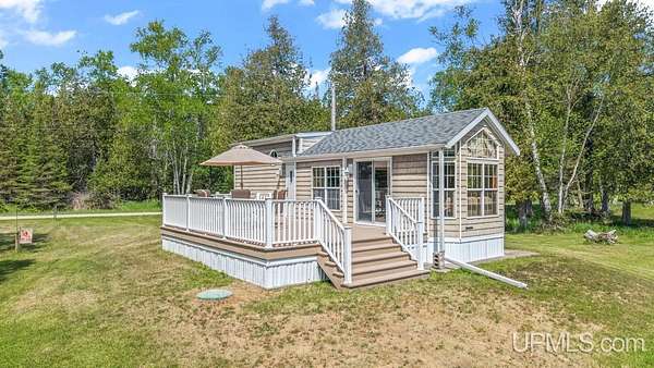 0.94 Acres of Land with Home for Sale in Rapid River, Michigan