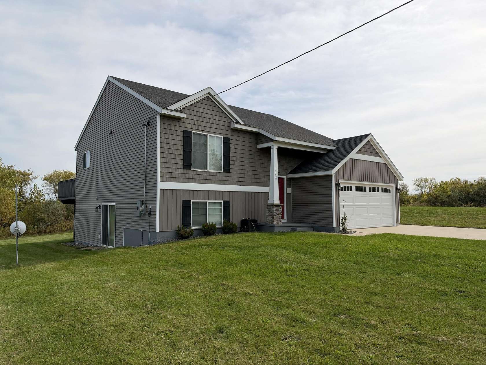 2.74 Acres of Land with Home for Sale in Grant, Michigan