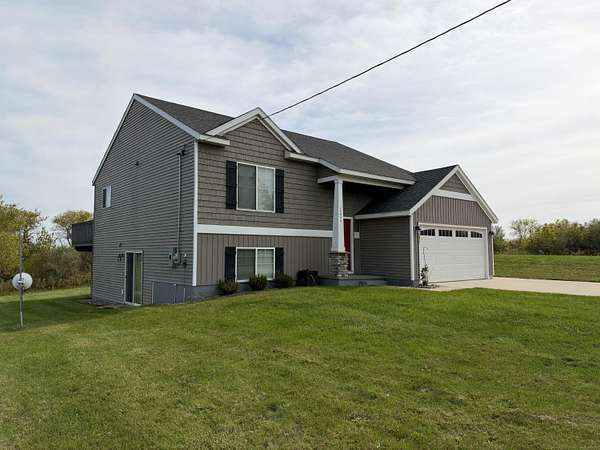 2.74 Acres of Land with Home for Sale in Grant, Michigan