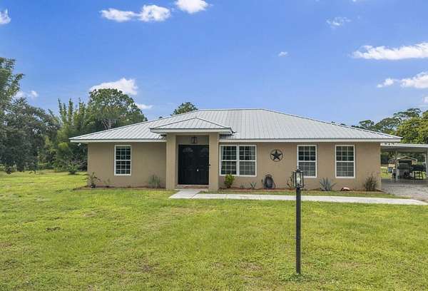 4.73 Acres of Land with Home for Sale in Okeechobee, Florida