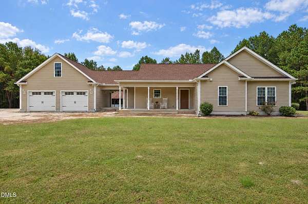 23.2 Acres of Land with Home for Sale in Bunnlevel, North Carolina