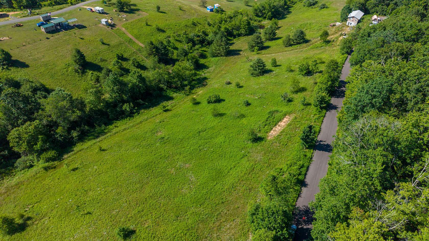 1.51 Acres of Residential Land for Sale in Grassy Creek, North Carolina