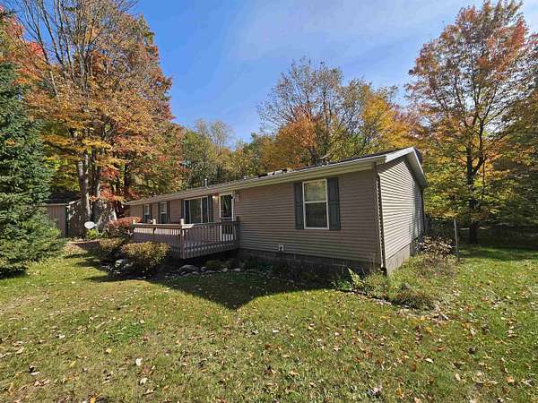 2.3 Acres of Land with Home for Sale in Harrison, Michigan