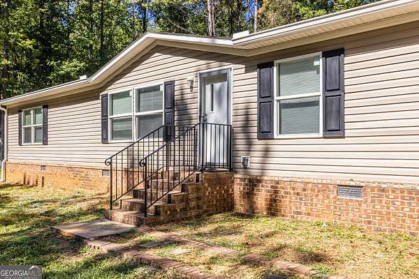 1.5 Acres of Land with Home for Sale in Jasper, Georgia