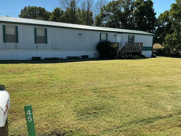 1.52 Acres of Land with Home for Sale in McKenzie, Tennessee