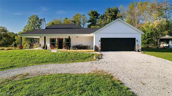 7.24 Acres of Land with Home for Sale in Louisville, Ohio