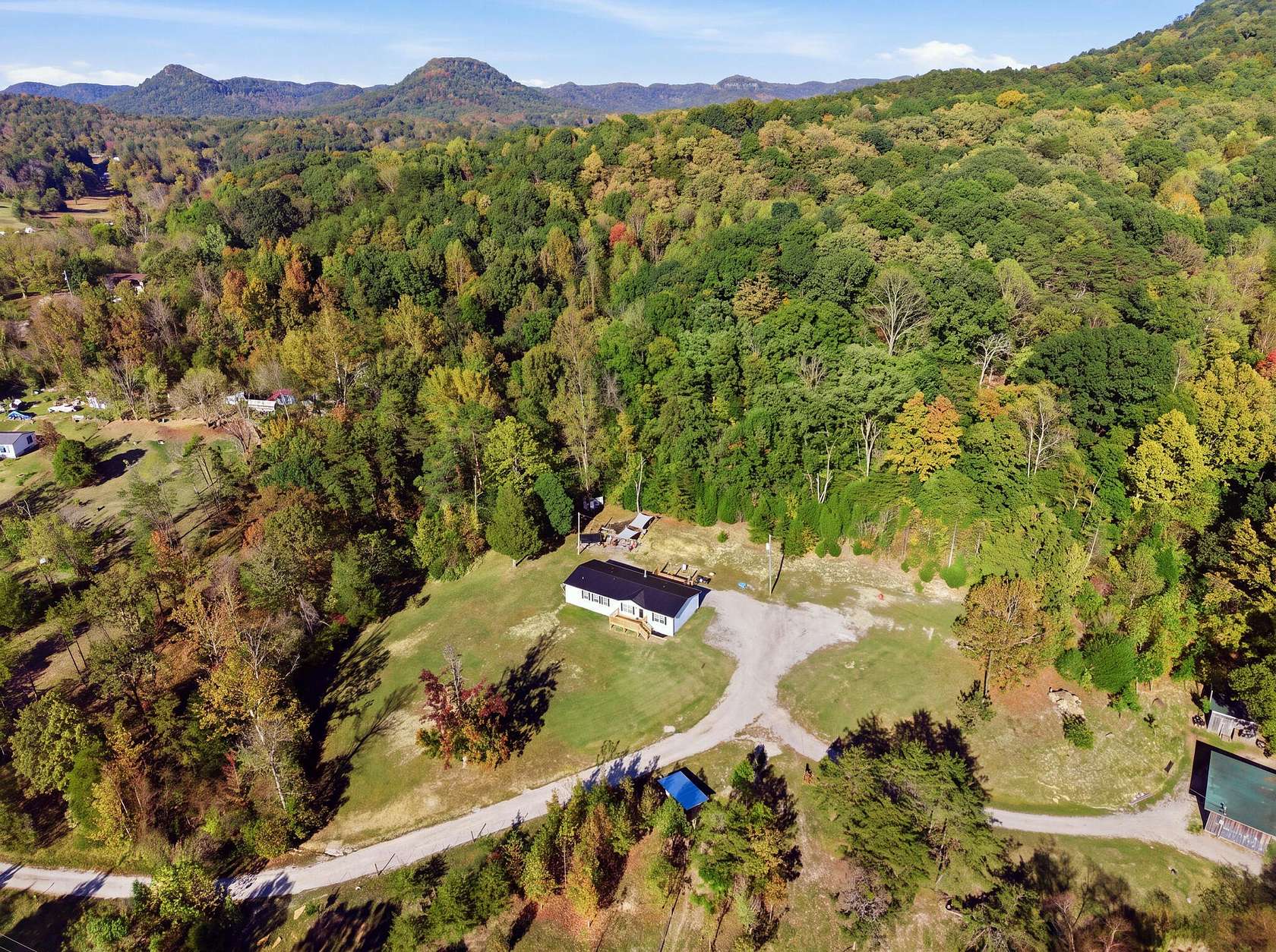 23.4 Acres of Recreational Land with Home for Sale in Irvine, Kentucky