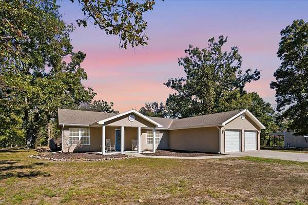 115 Acres of Recreational Land with Home for Sale in Cross Timbers, Missouri