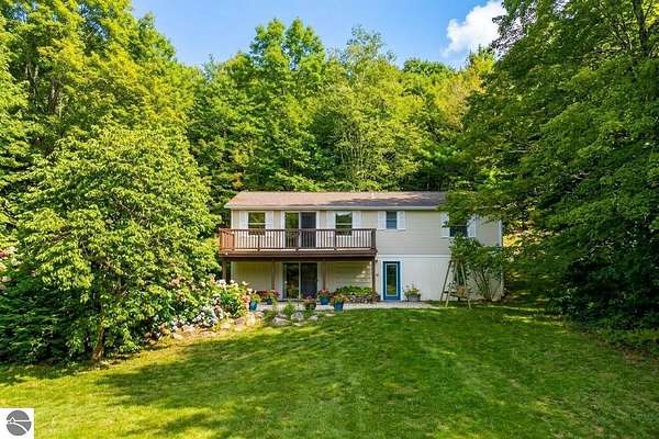 15.2 Acres of Land with Home for Sale in Suttons Bay, Michigan