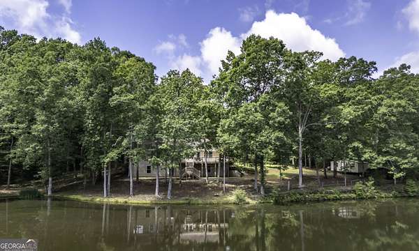 9.15 Acres of Land with Home for Sale in Roopville, Georgia