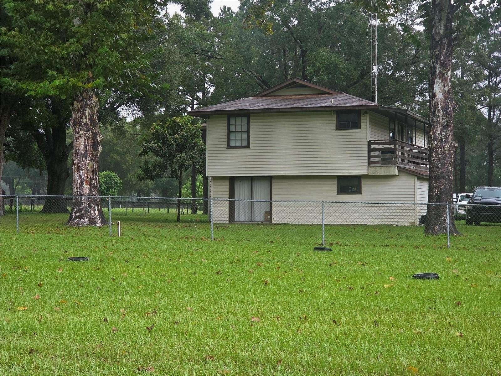 16.9 Acres of Land with Home for Sale in Citra, Florida