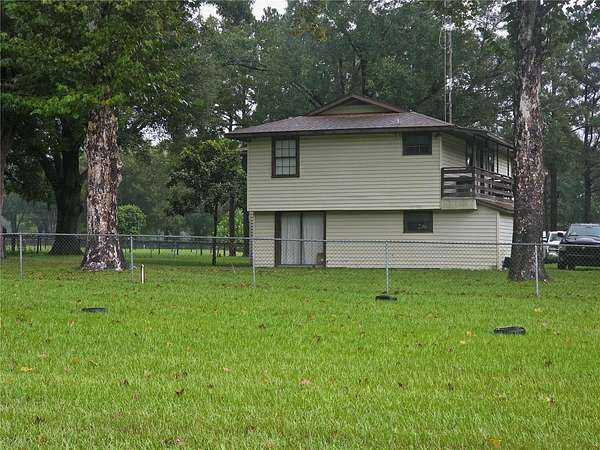 16.9 Acres of Land with Home for Sale in Citra, Florida