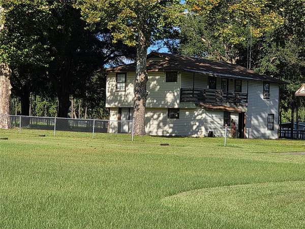 16.9 Acres of Land with Home for Sale in Citra, Florida
