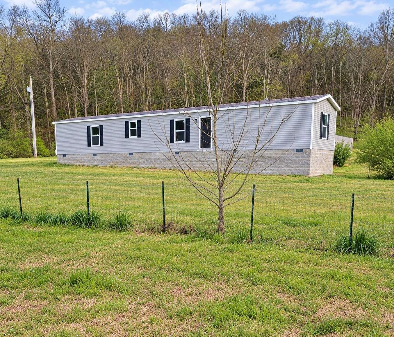 5.32 Acres of Land with Home for Sale in Elmwood, Tennessee