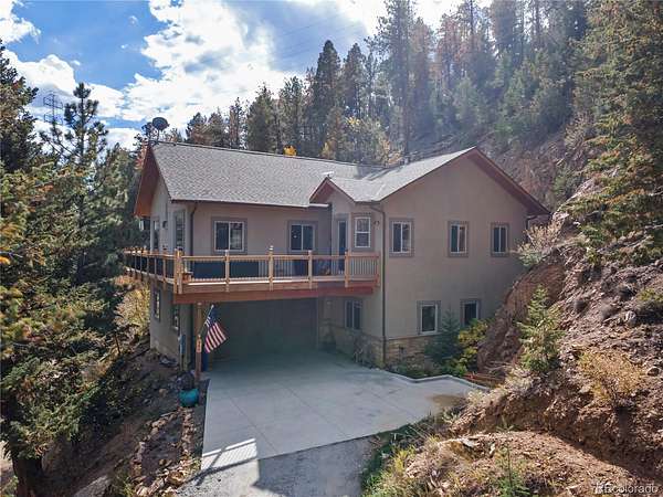 10.3 Acres of Land with Home for Sale in Idaho Springs, Colorado
