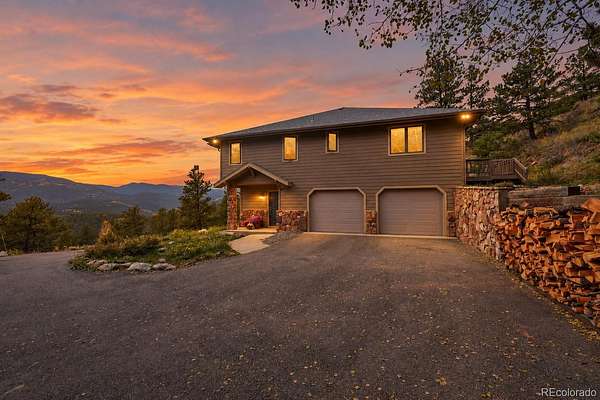 2.64 Acres of Land with Home for Sale in Evergreen, Colorado