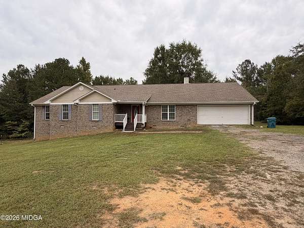 6.38 Acres of Land with Home for Lease in Forsyth, Georgia